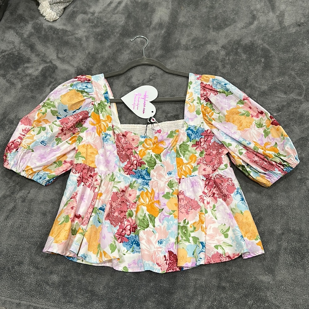 Women’s puff sleeve peplum top